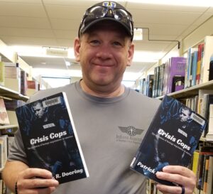 Pat Doering - The Crisis Cop - stops at the local library to find - HIS BOOKS! Do you have them yet?