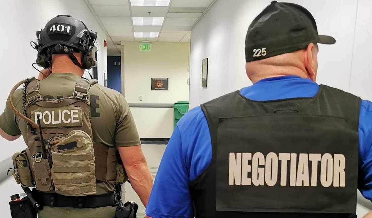A SWAT Operator and Lt. Pat Doering: Crisis Negotiatior